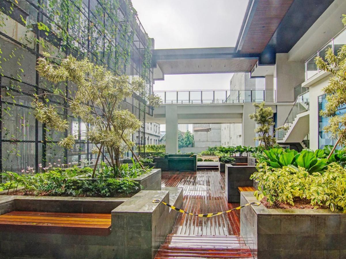ديبوك Oyo 90339 Evenciio Apartment Syariah المظهر الخارجي الصورة