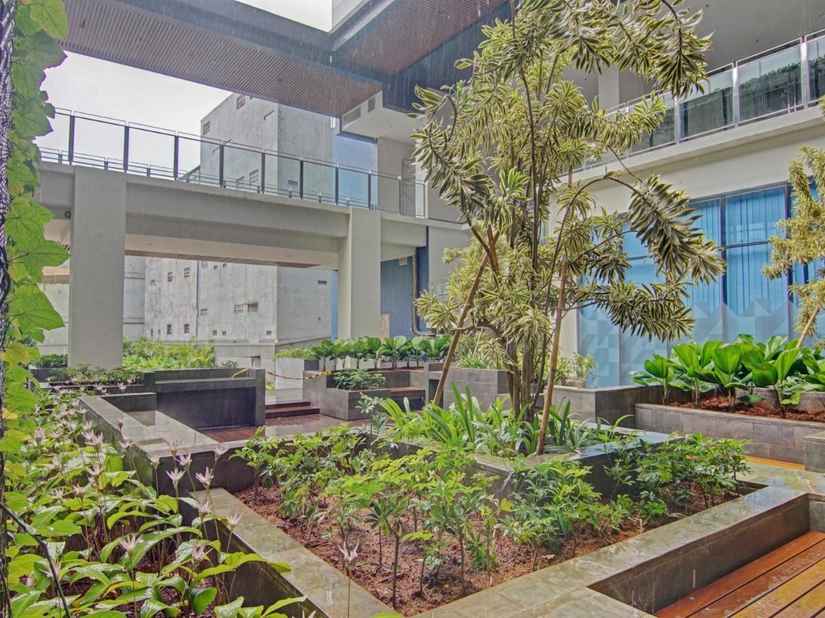 ديبوك Oyo 90339 Evenciio Apartment Syariah المظهر الخارجي الصورة