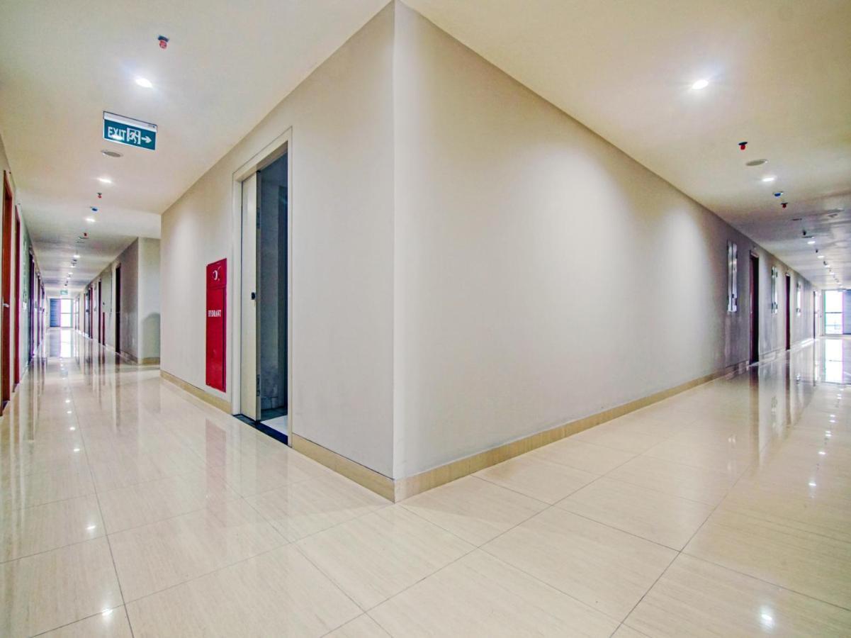 ديبوك Oyo 90339 Evenciio Apartment Syariah المظهر الخارجي الصورة