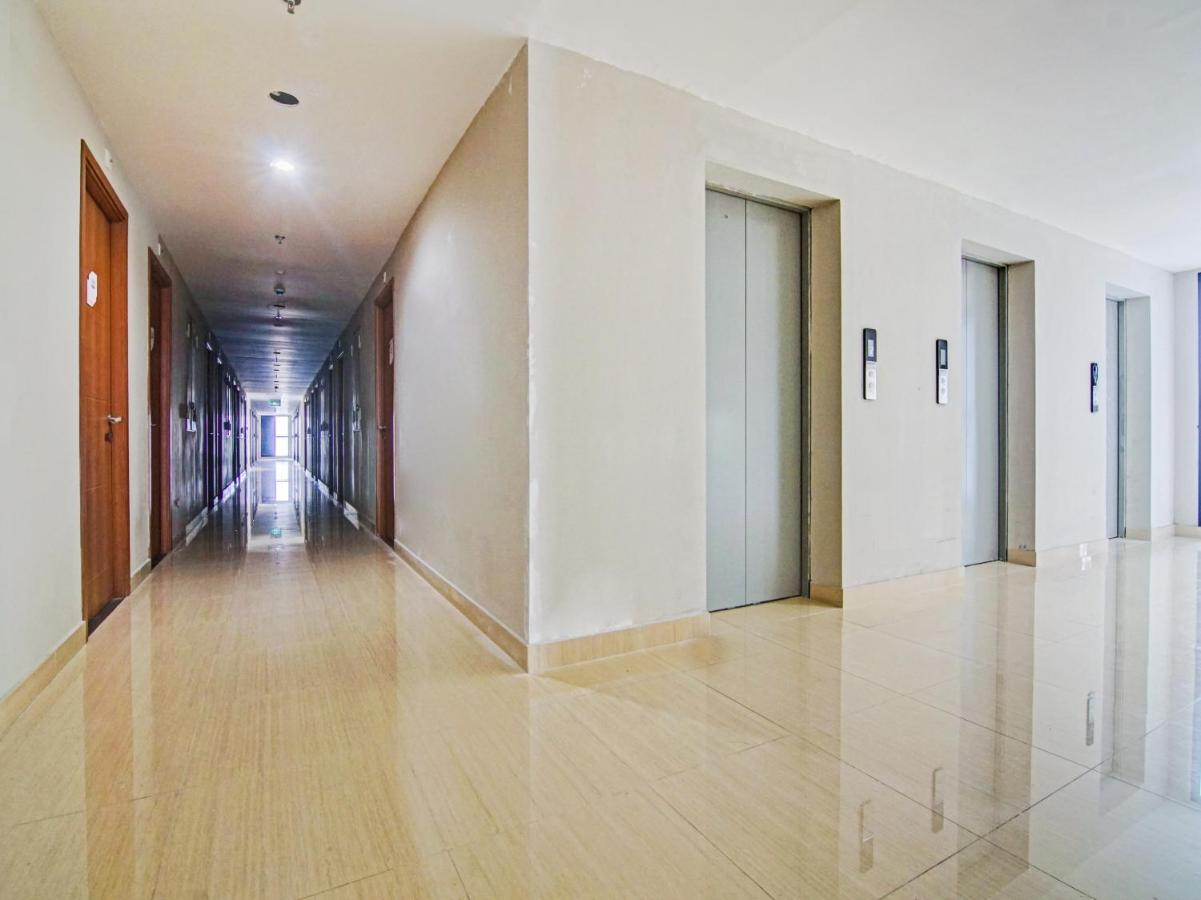 ديبوك Oyo 90339 Evenciio Apartment Syariah المظهر الخارجي الصورة