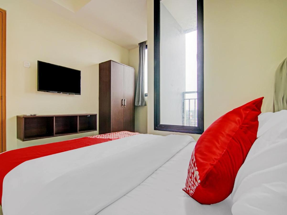 ديبوك Oyo 90339 Evenciio Apartment Syariah المظهر الخارجي الصورة
