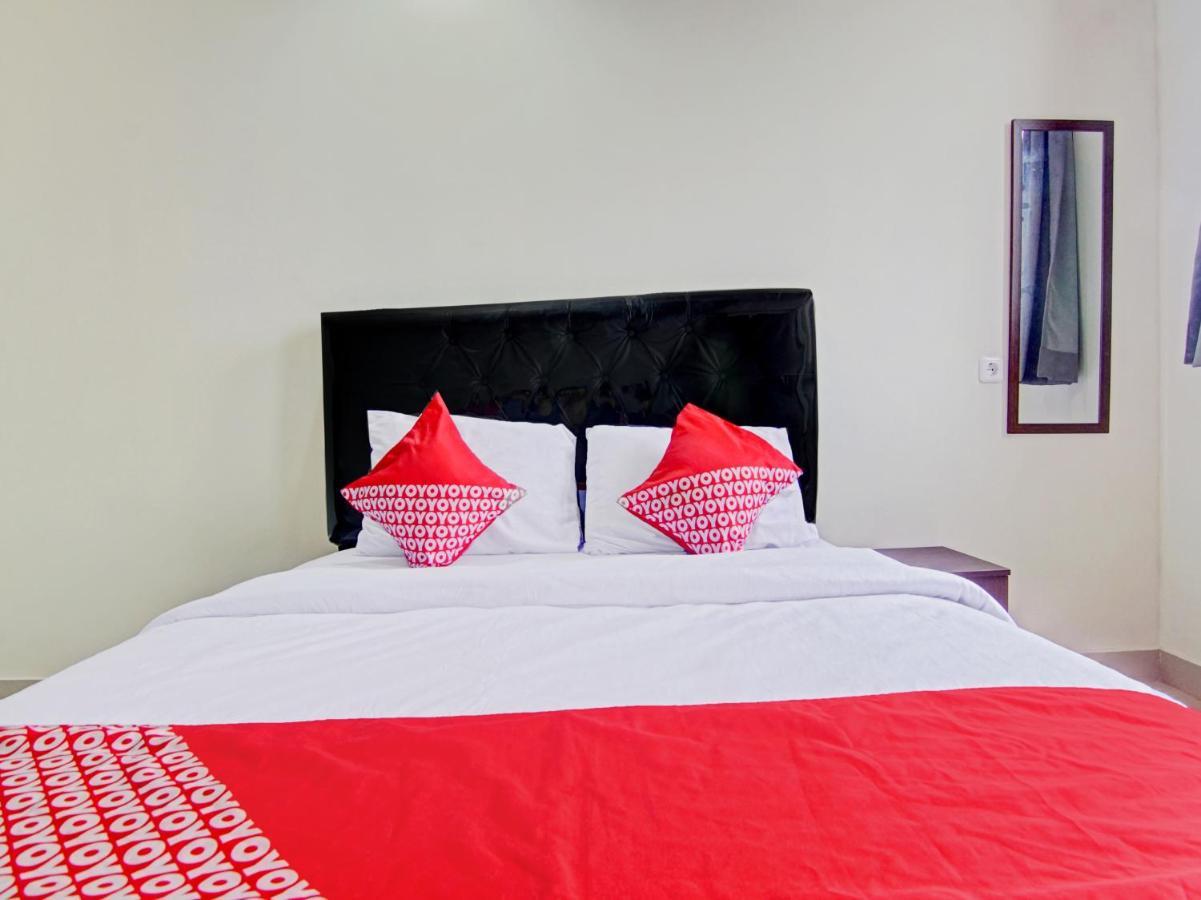 ديبوك Oyo 90339 Evenciio Apartment Syariah المظهر الخارجي الصورة