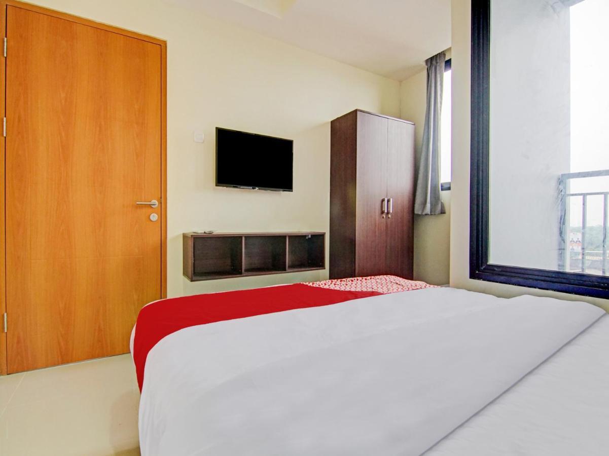 ديبوك Oyo 90339 Evenciio Apartment Syariah المظهر الخارجي الصورة