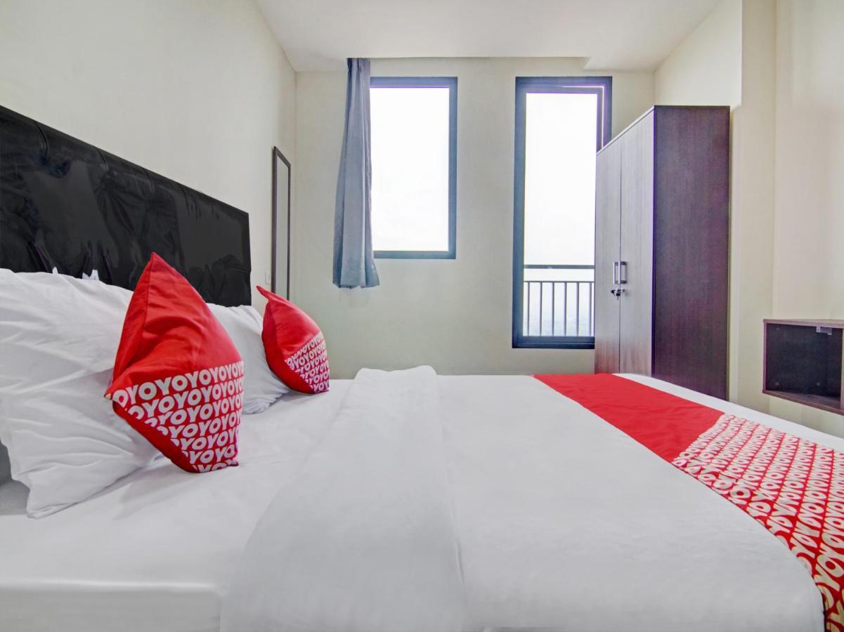 ديبوك Oyo 90339 Evenciio Apartment Syariah المظهر الخارجي الصورة