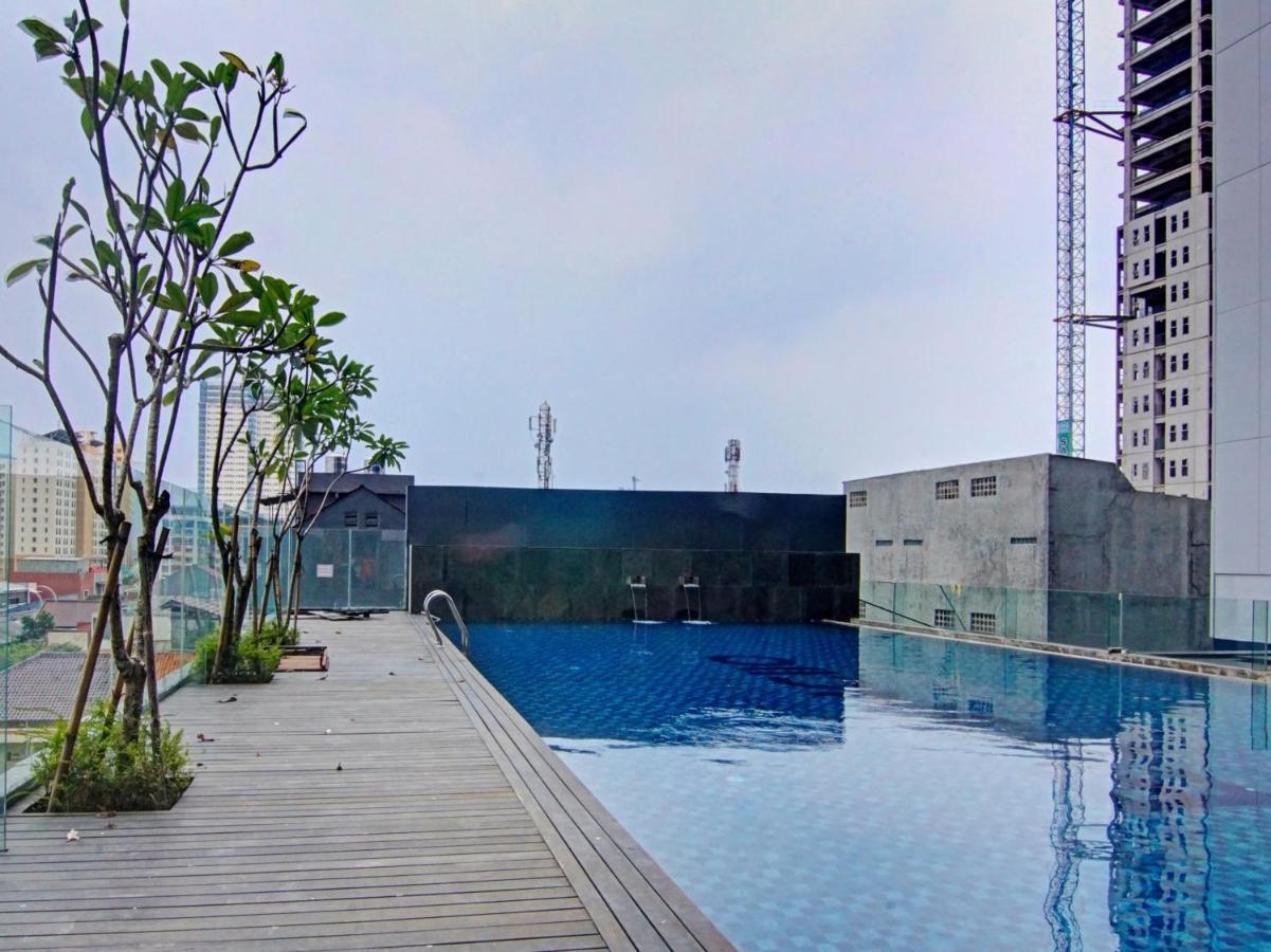 ديبوك Oyo 90339 Evenciio Apartment Syariah المظهر الخارجي الصورة
