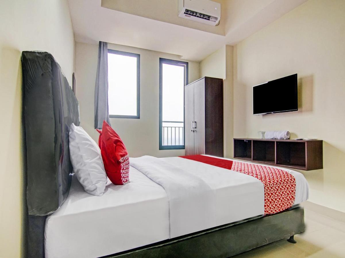 ديبوك Oyo 90339 Evenciio Apartment Syariah المظهر الخارجي الصورة