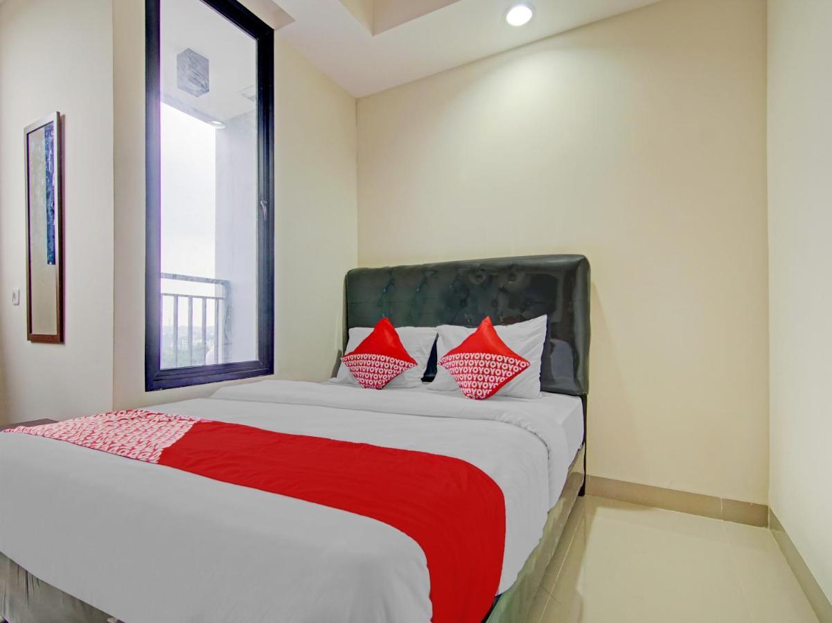 ديبوك Oyo 90339 Evenciio Apartment Syariah المظهر الخارجي الصورة