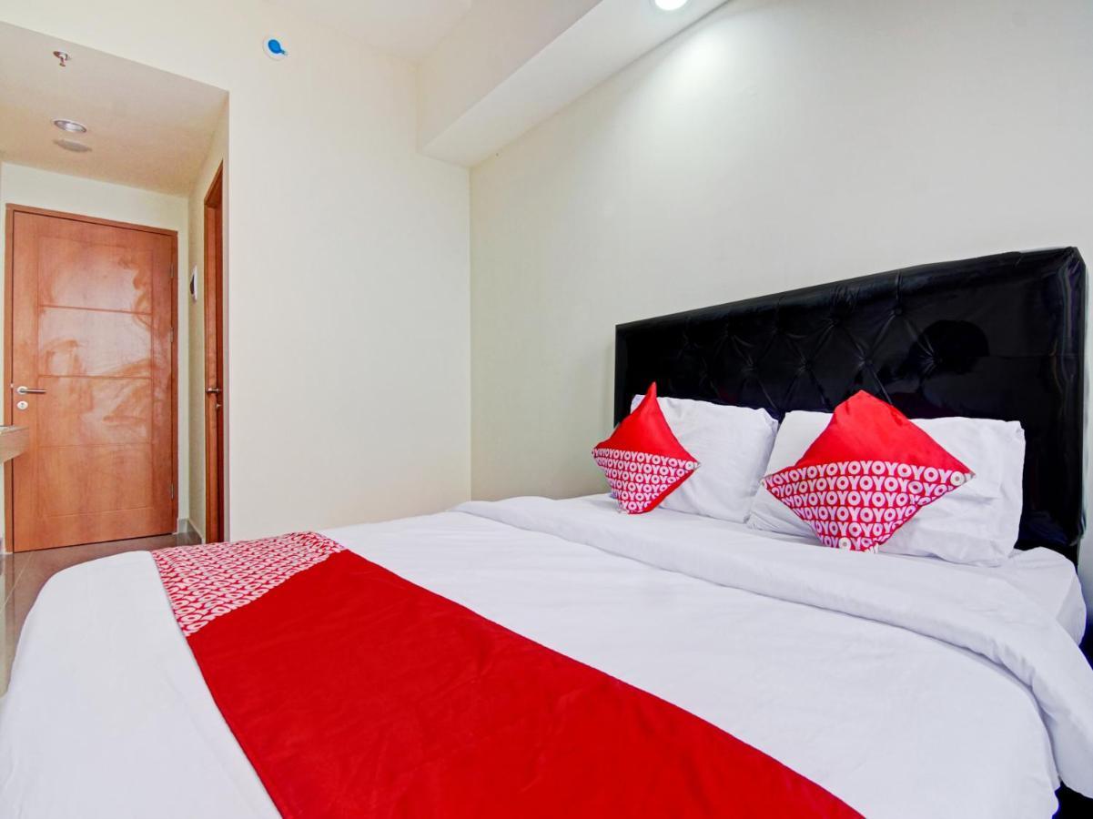 ديبوك Oyo 90339 Evenciio Apartment Syariah المظهر الخارجي الصورة