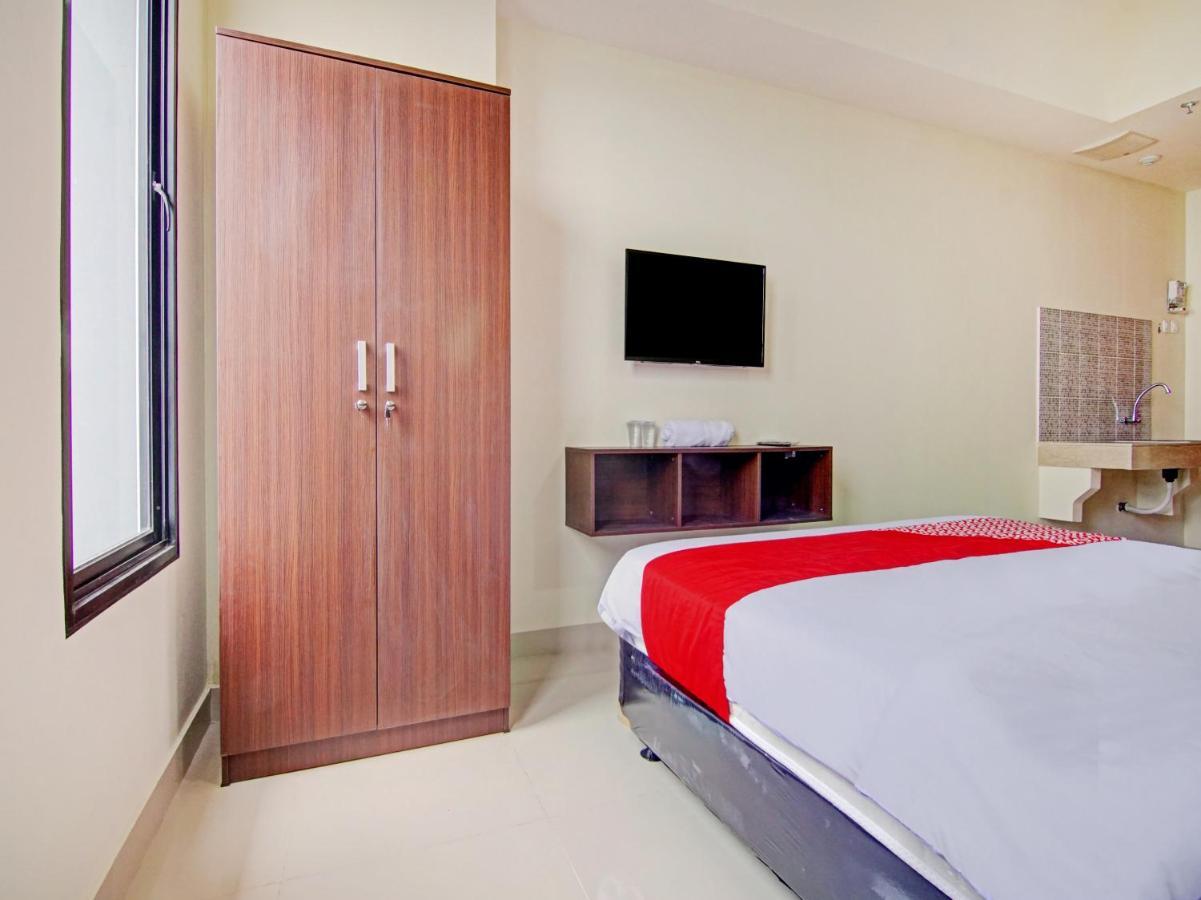 ديبوك Oyo 90339 Evenciio Apartment Syariah المظهر الخارجي الصورة